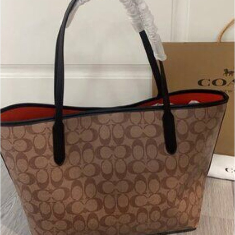 Coach Brown Signature Canvas Tote with Black Handles and Orange Interior - Picture 6 of 6